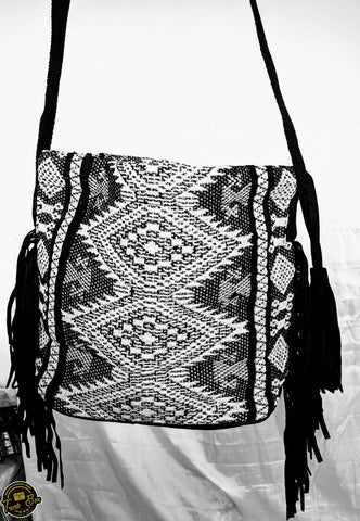 Black and white messenger bag with patterns
